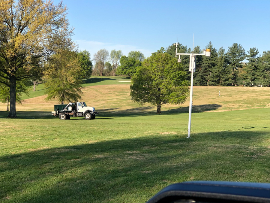 contract spreader on a golf course
